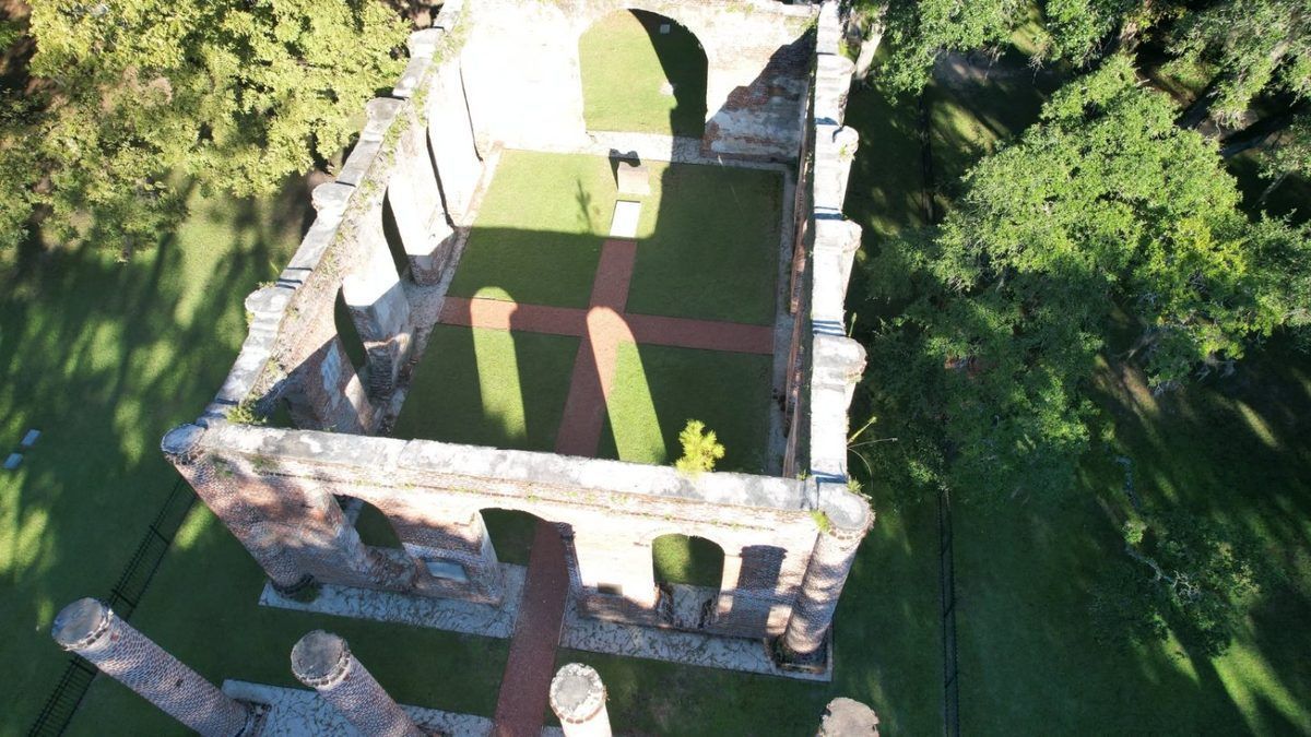 Overhead drone photo of historic brick church ruins