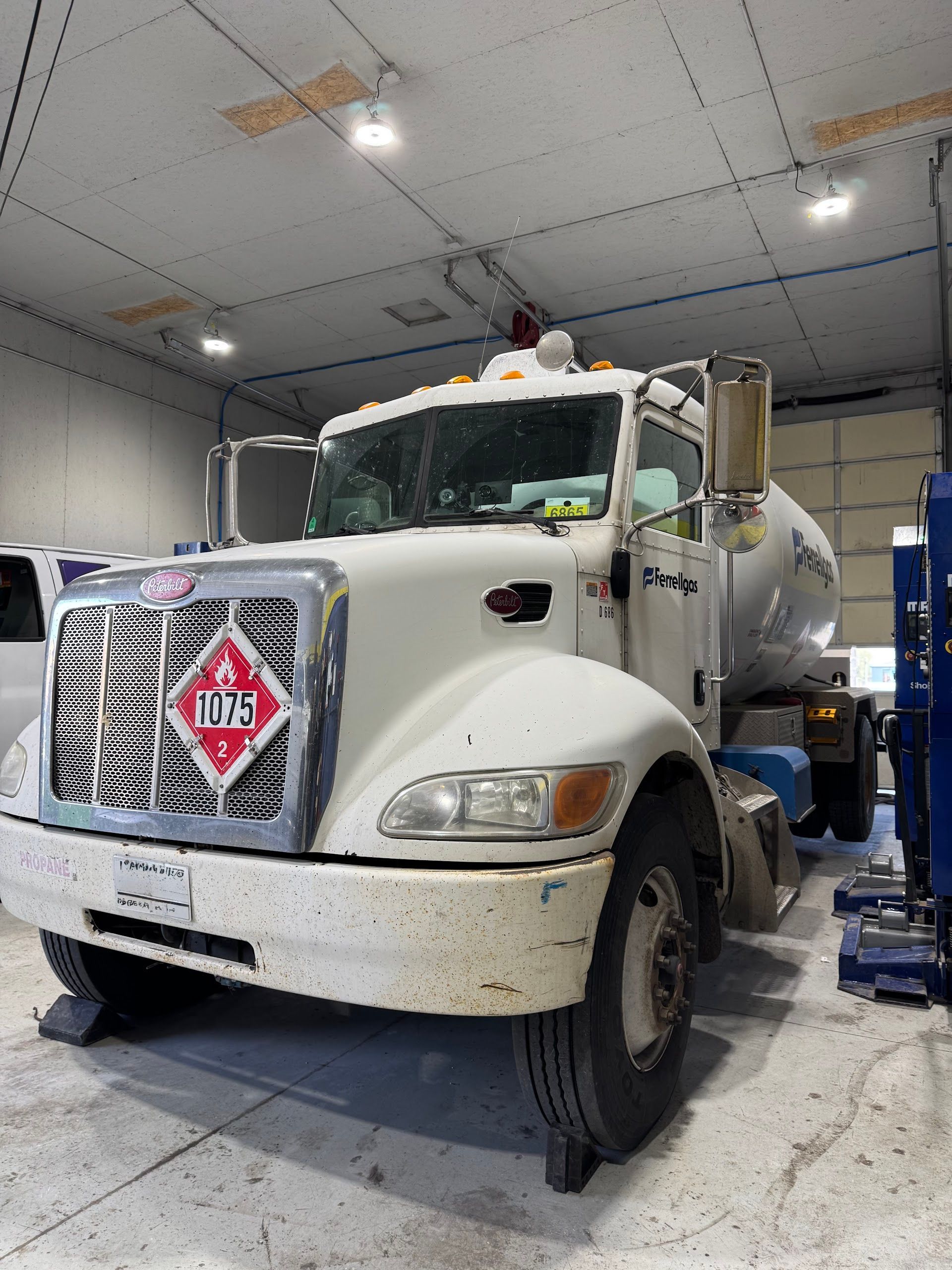 White Semi Truck Inside Diesel Repair Shop | Spooled Up Diesel Repair