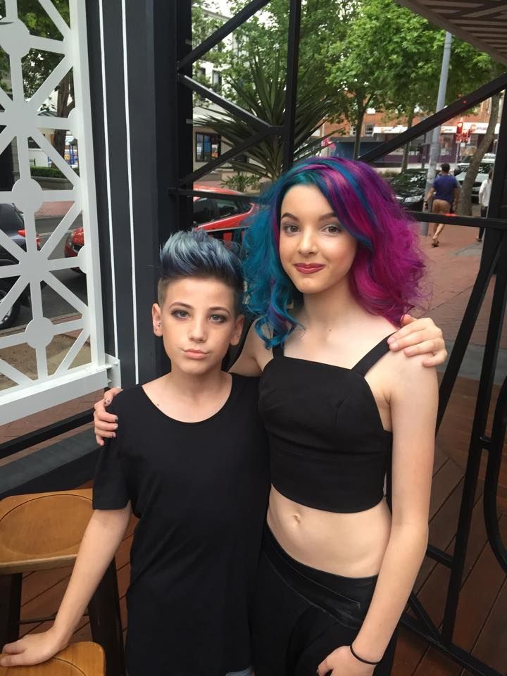 A Boy and A Girl with Blue and Purple Hair Are Posing for A Picture — Hair It Is In Balgownie, NSW
