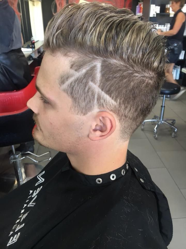 A Man Is Getting His Hair Cut at A Barber Shop — Hair It Is In Balgownie, NSW