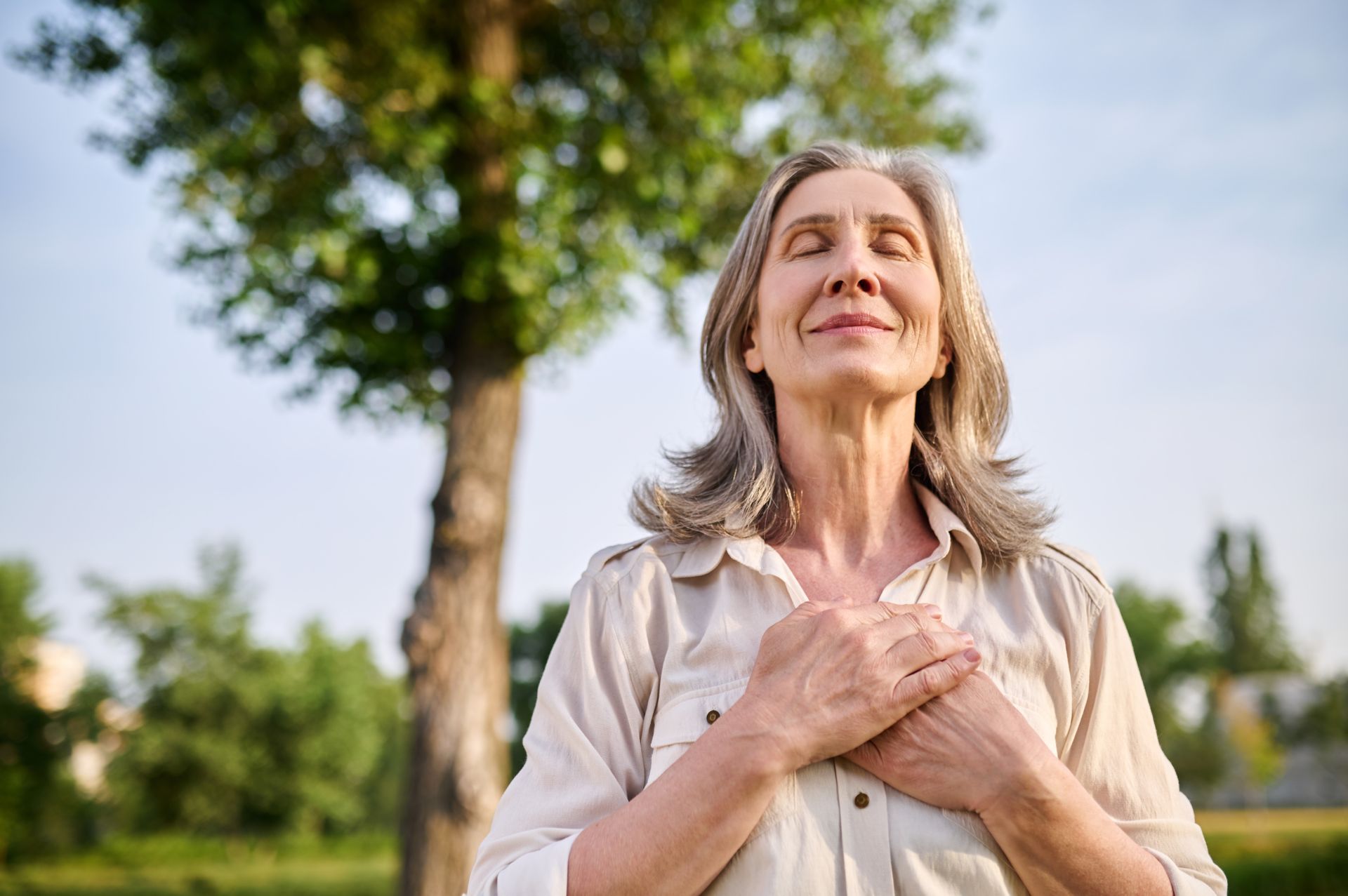 A woman with her eyes closed