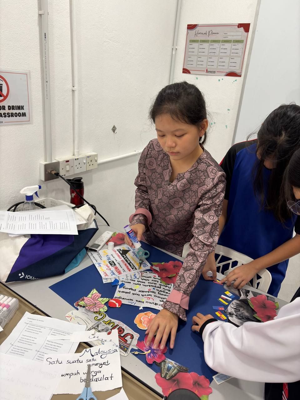 Students making decoration for Malaysia Day