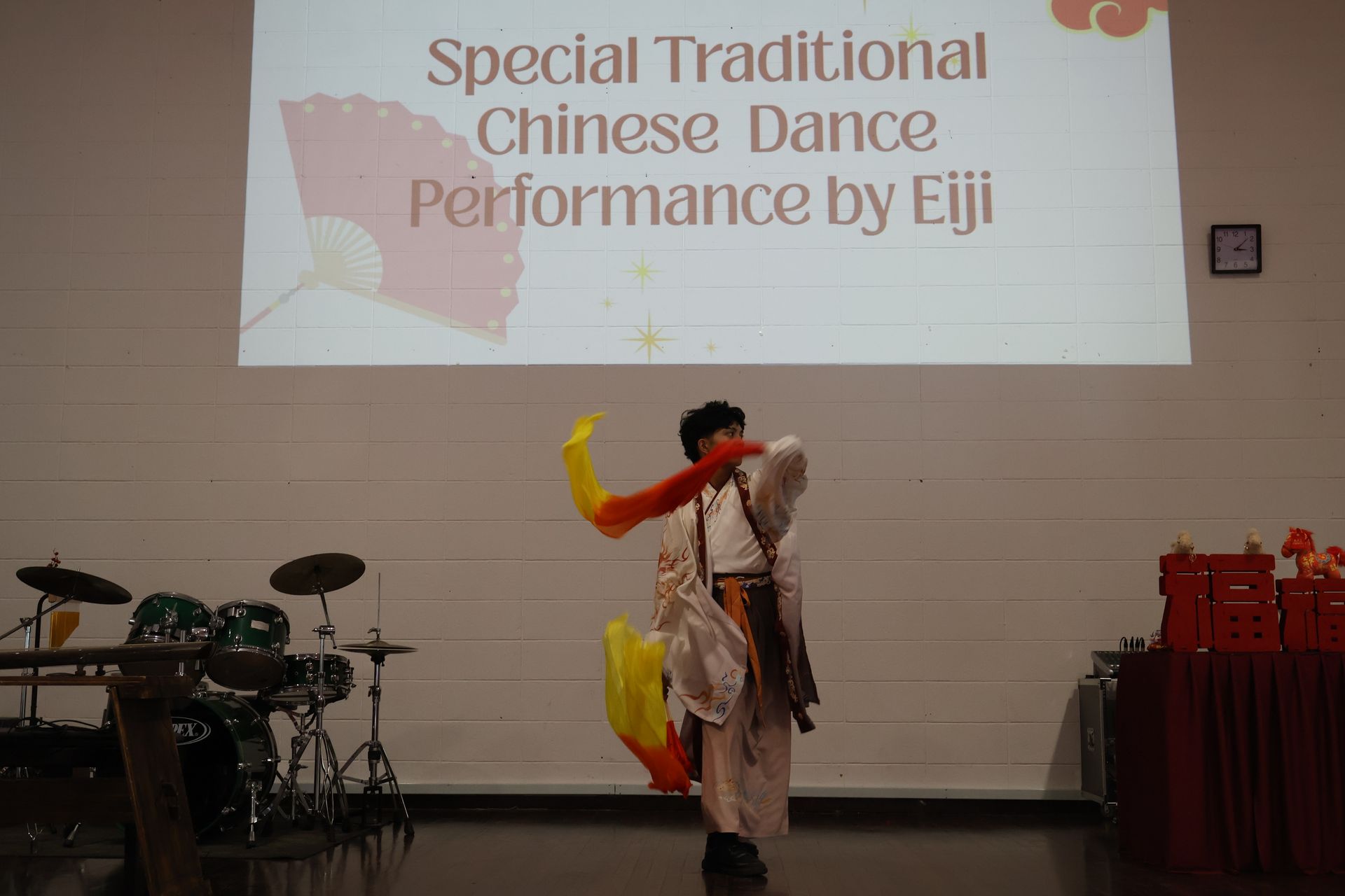 The performance celebrates Chinese culture and adds a vibrant cultural element to the school event.