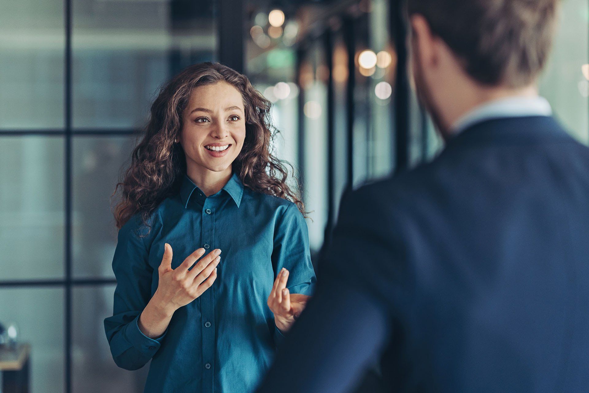 Businesswoman Talking to a Colleague — Ontario, CA — PYA Financial Services