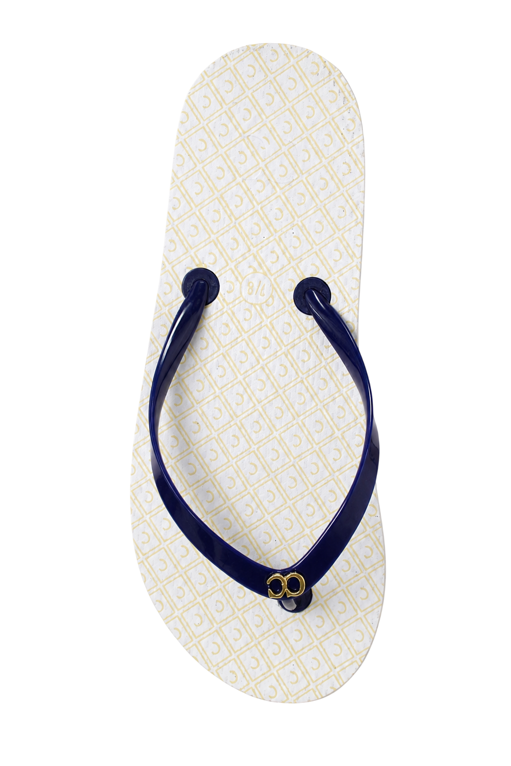 White flip-flop sandal with a navy strap and a small gold ring detail on a plain background