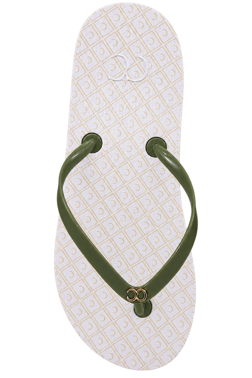 White flip-flop sandal with olive-green straps and a small gold heart charm