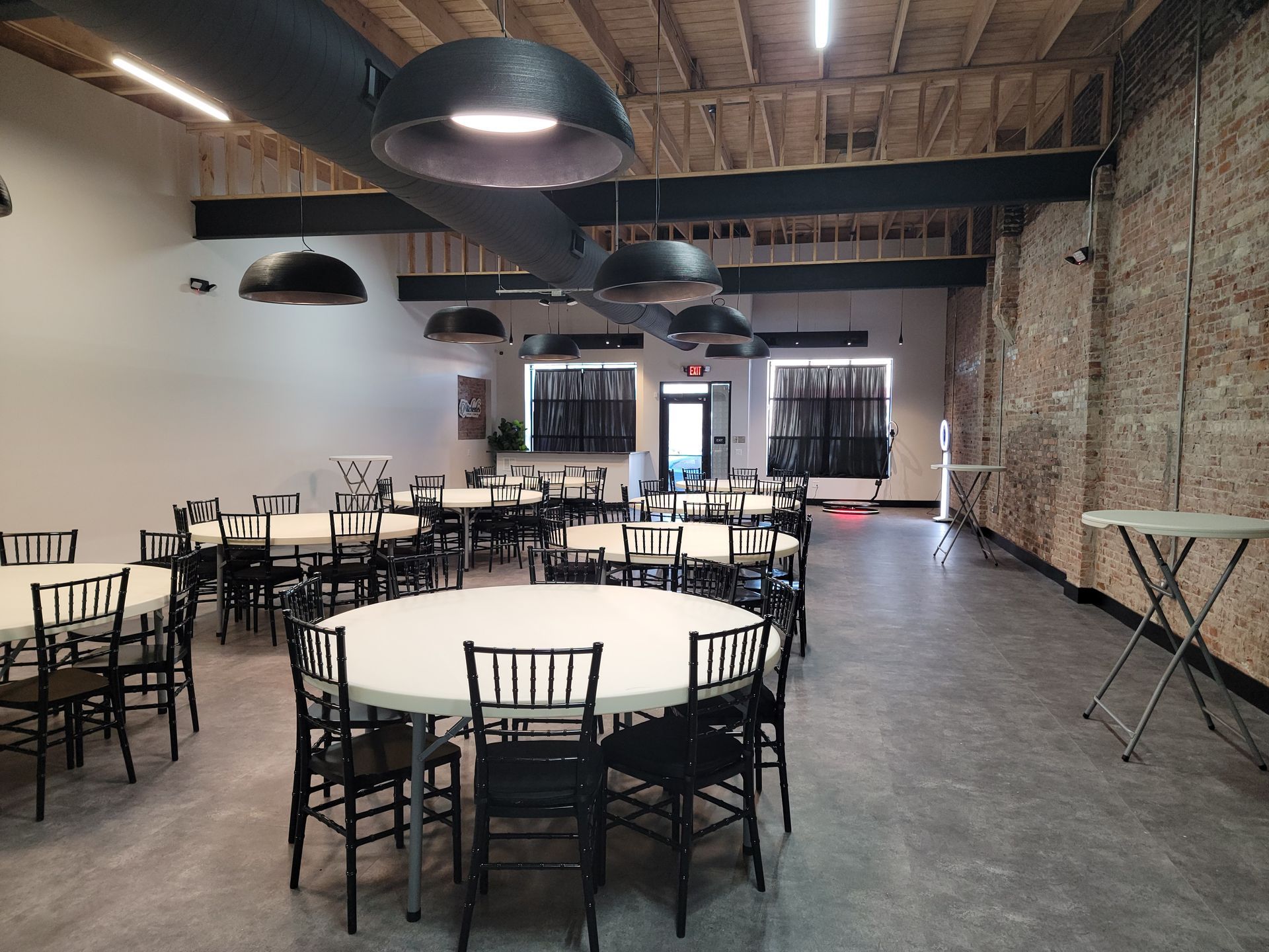 Table and chairs setup at The Rochester