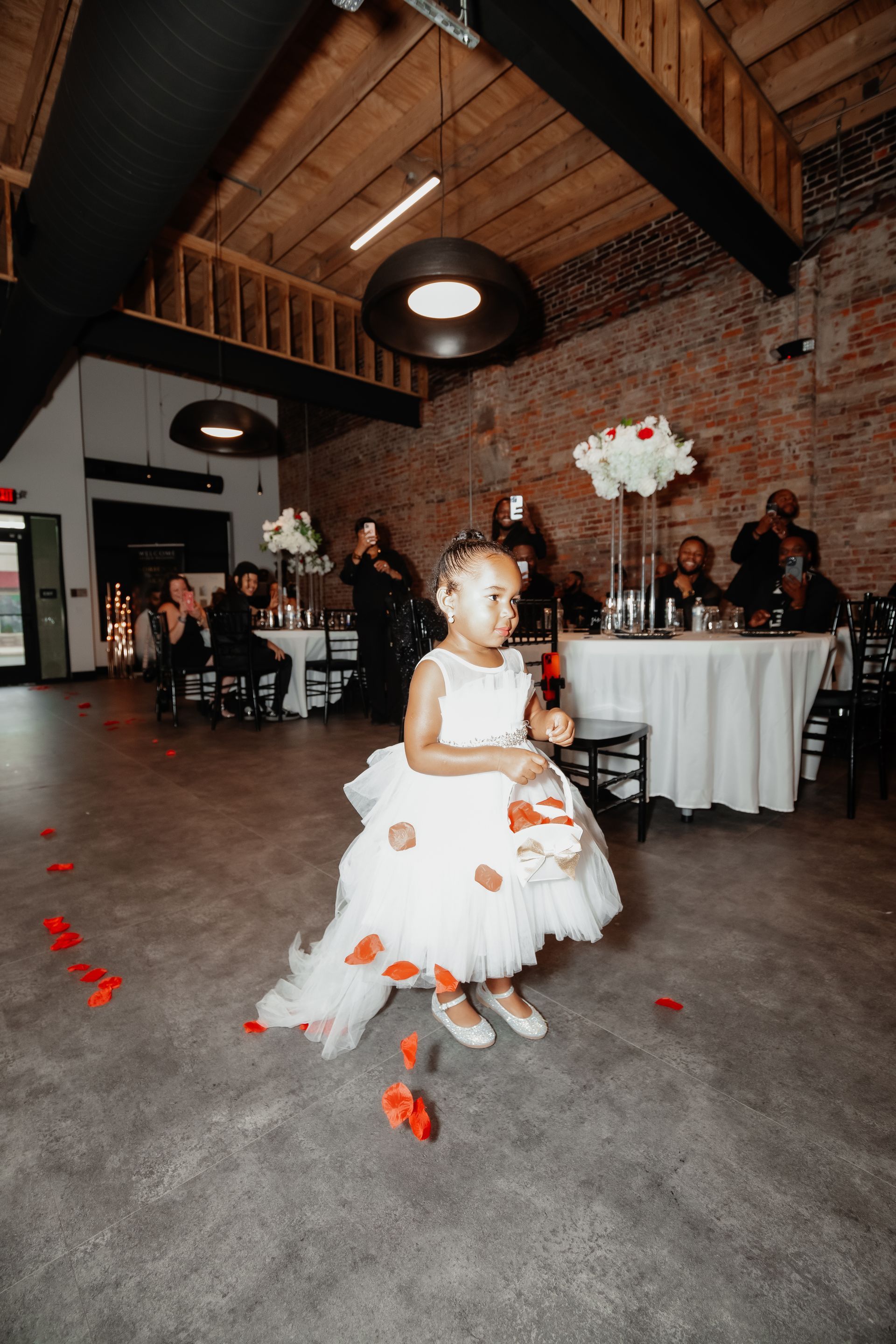 A beautiful flower girl during a wedding at The Rochester Event Center