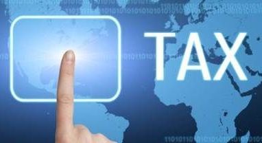 A person is pressing a button that says tax