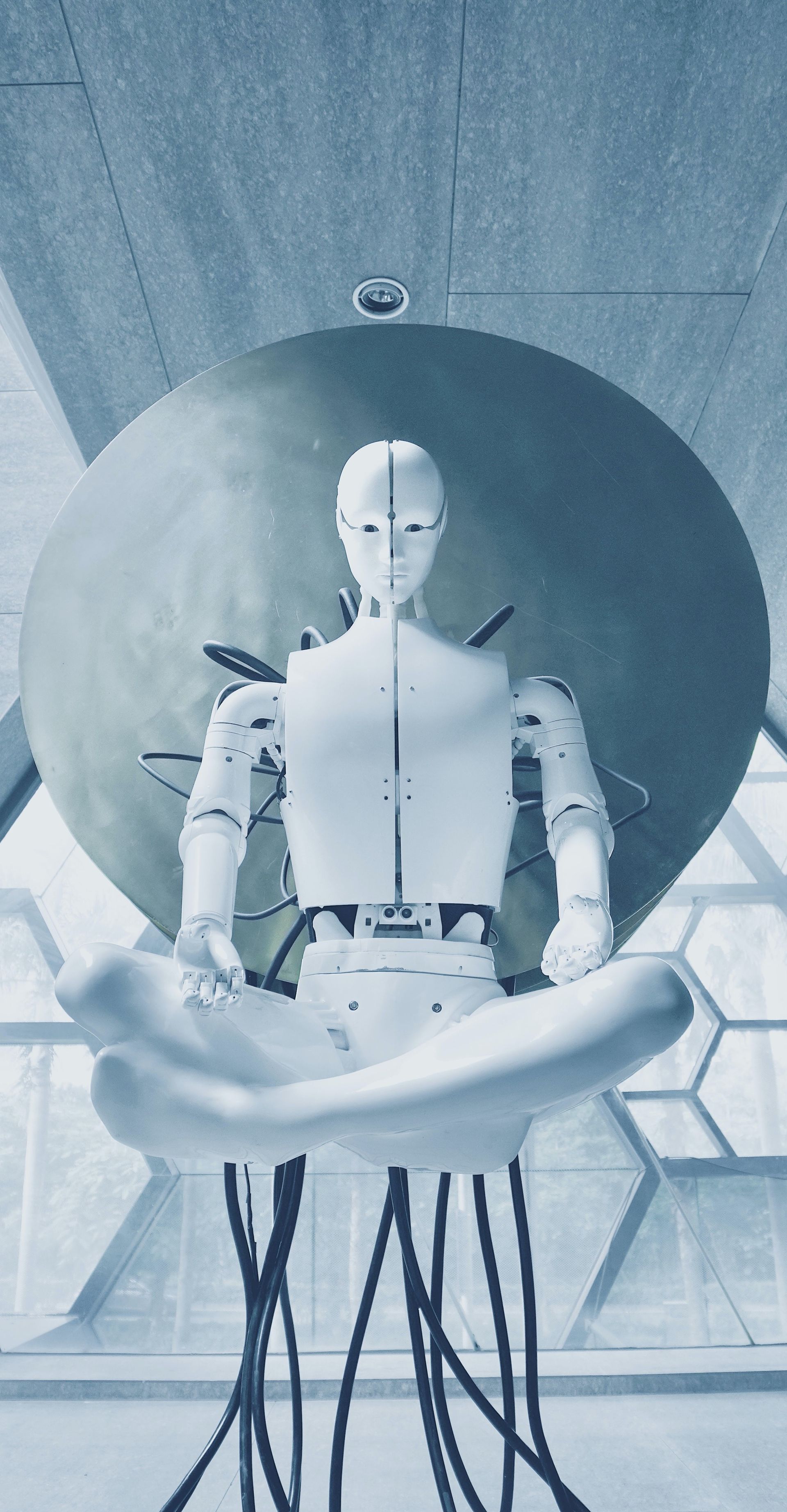 Image of robot sitting cross legged