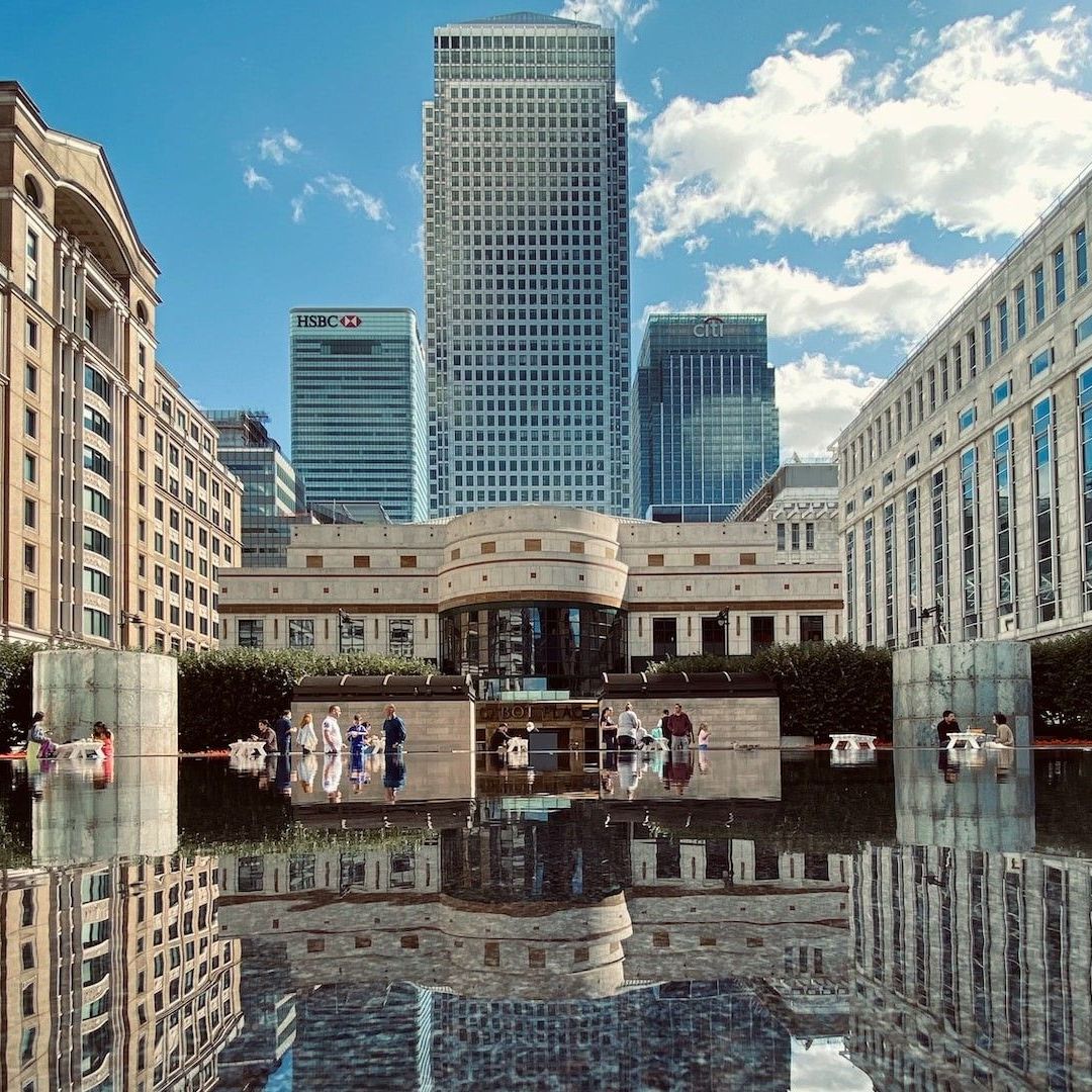 A view of Canary Wharf and its reflection in a body of water
