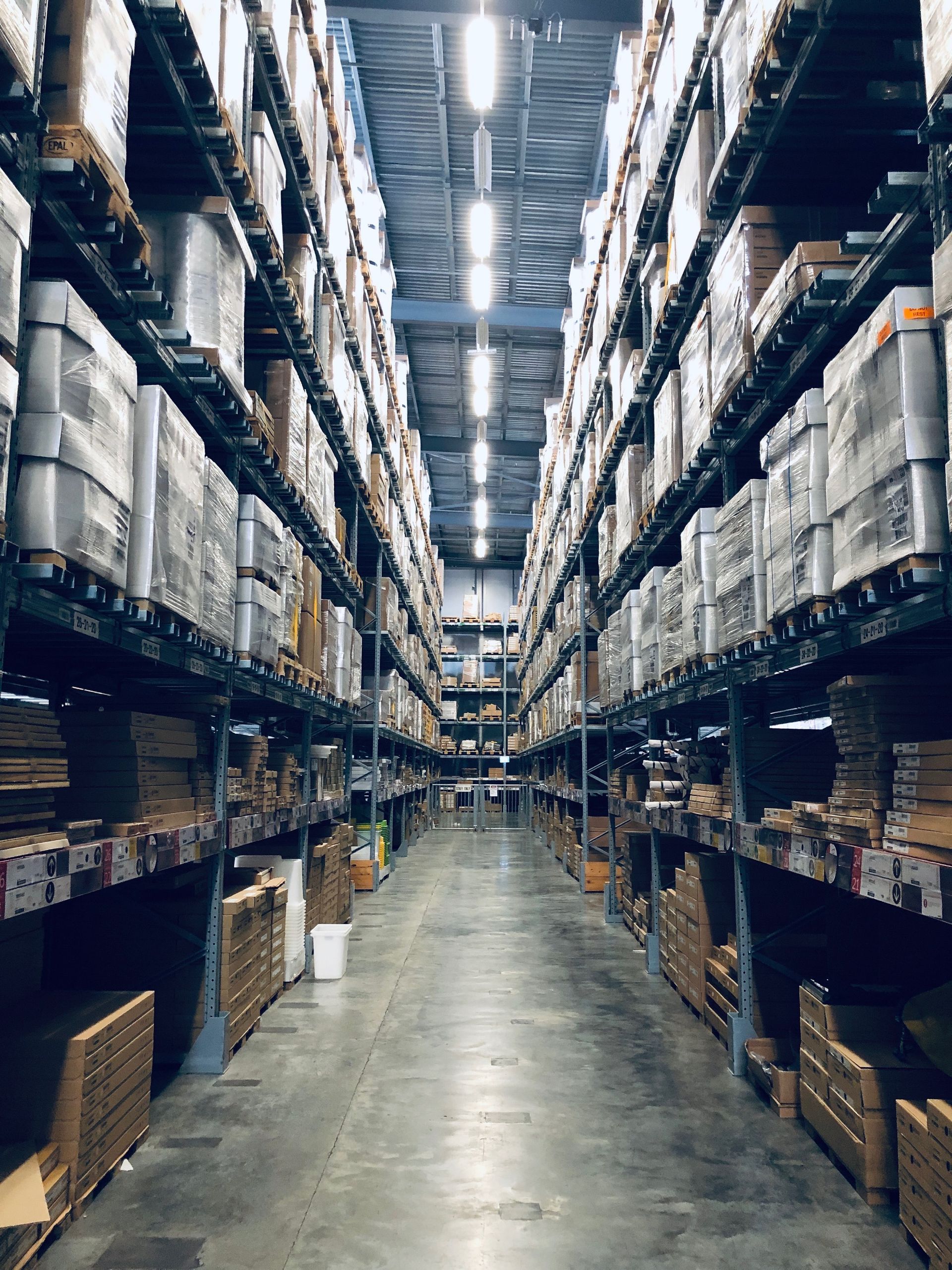 A warehouse filled with lots of shelves and boxes.