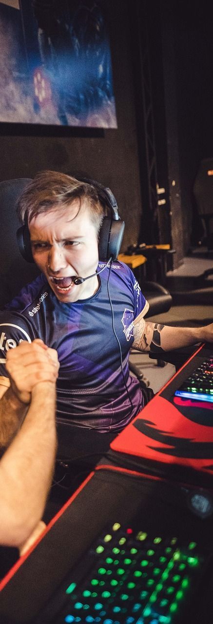 A man wearing headphones and a microphone is playing a video game.