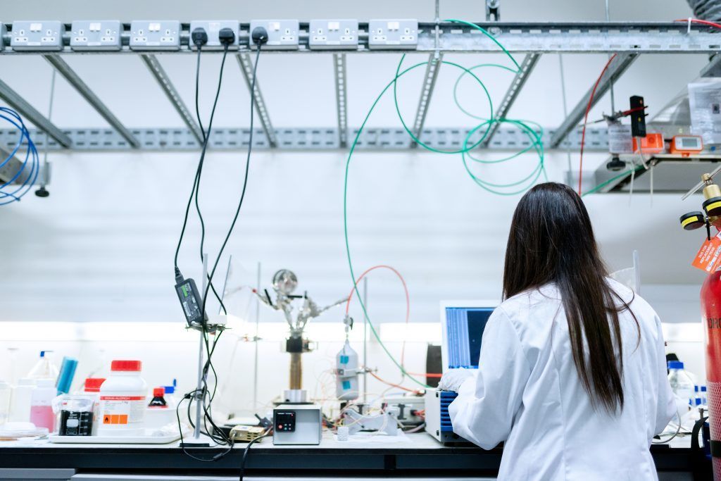 Woman in a lab coat in a laboratory