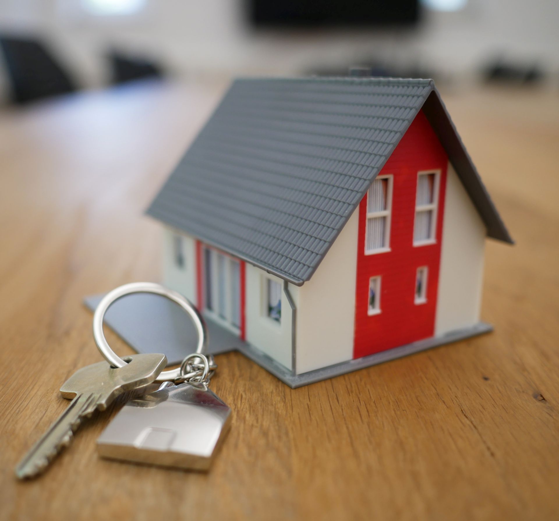 Small model hours with a set of keys on the table