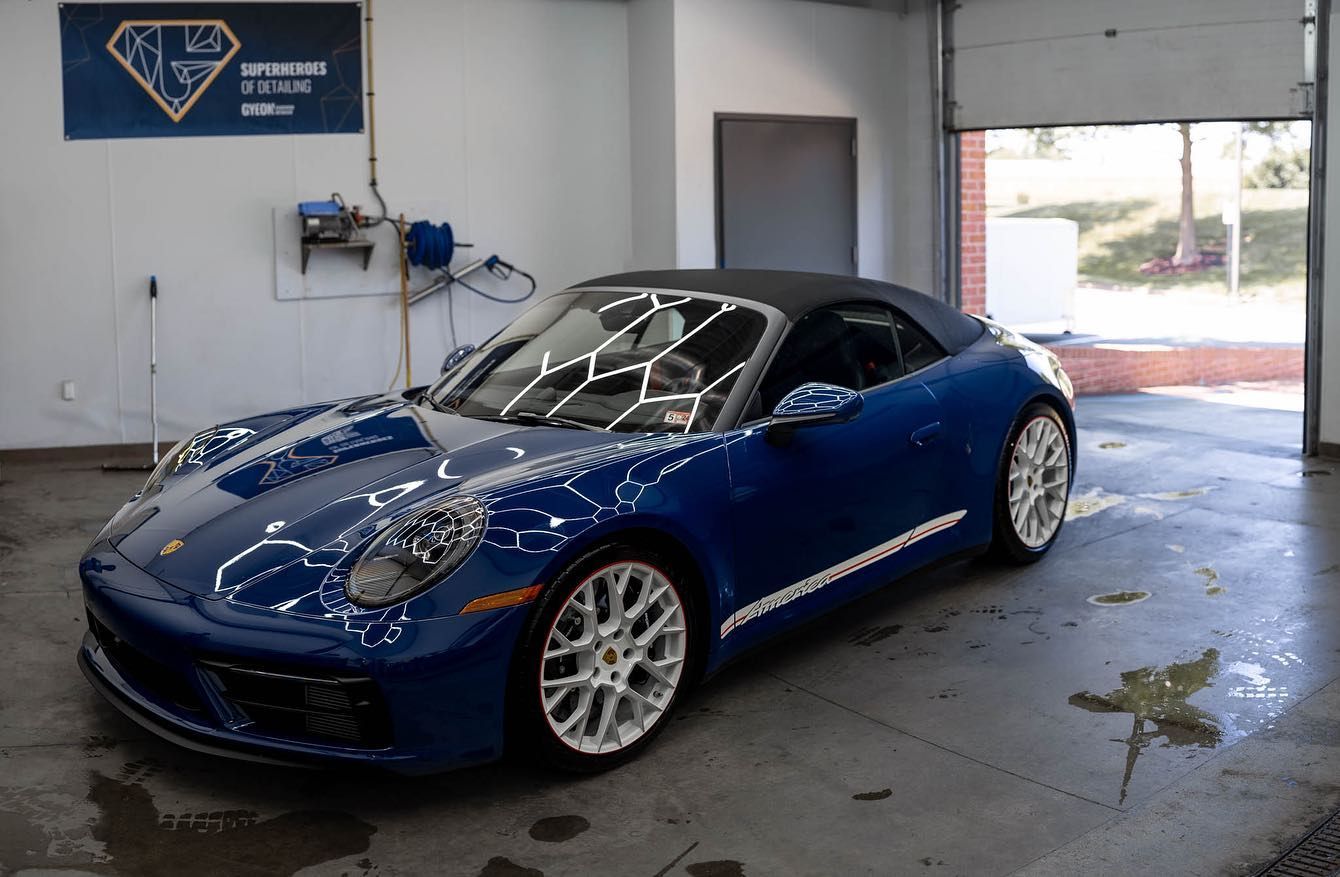 Blue sports car with a glossy ceramic coating finish.