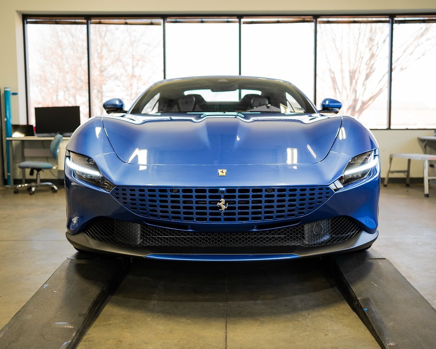Blue Ferrari with ceramic coating for long lasting paint protection and enhanced gloss.