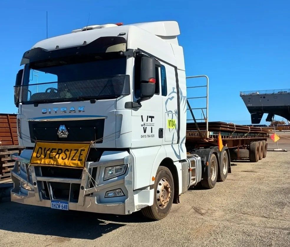 Tilt tray transport