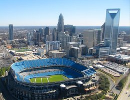 Charlotte City skyline with residential and commercial buildings looking over the panthers stadium