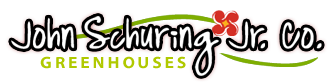 A logo for john scharing jr. co. greenhouses with a flower in the middle.