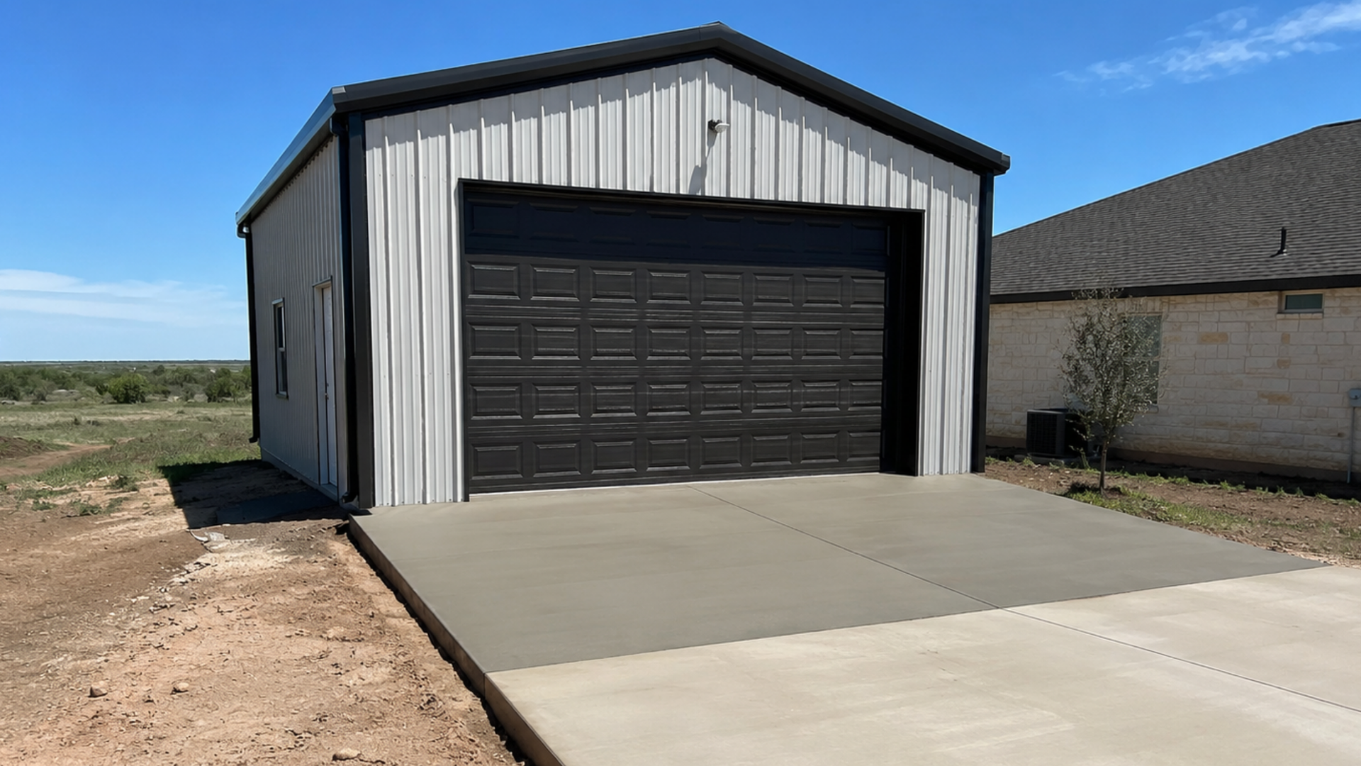 Finished concrete shop slab for a residential metal building in Midland TX