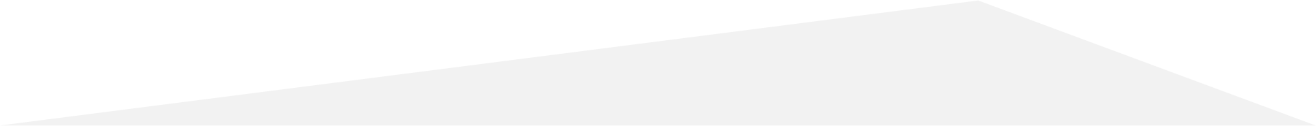 A plain, white, angled surface against a dark background.