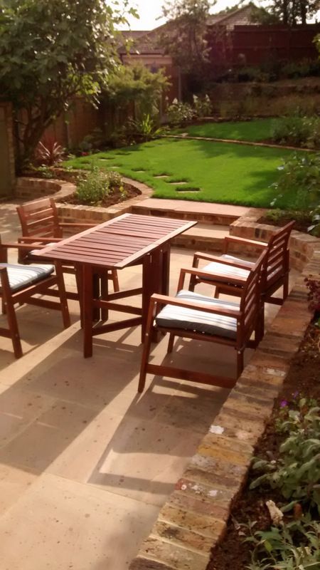 New paving creates a large seating and dining area