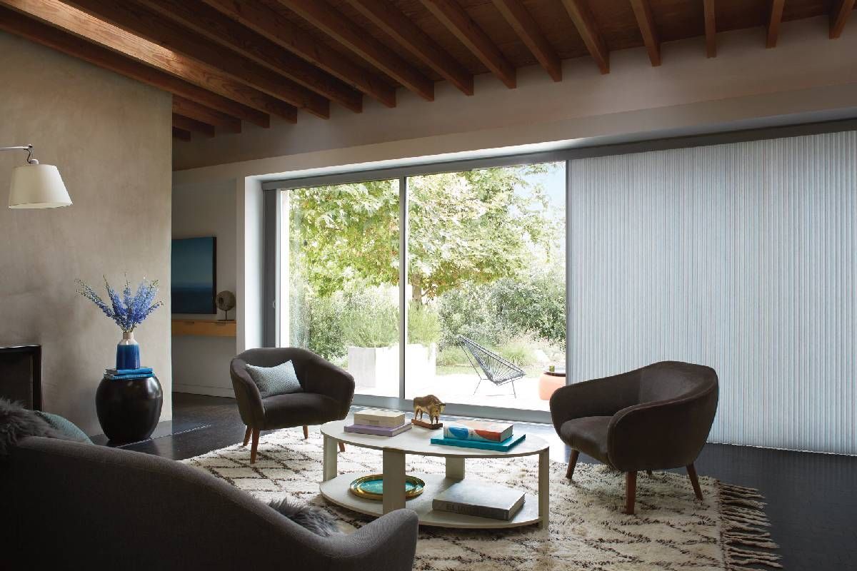 Hunter Douglas Duette® Cellular Shades adorning a sliding glass door at Harmony Blinds & Shutters near San Diego, California