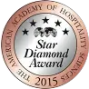 Sello del premio Estrella Diamante con forma de diamante, con texto en oro, plata y negro sobre fondo blanco.