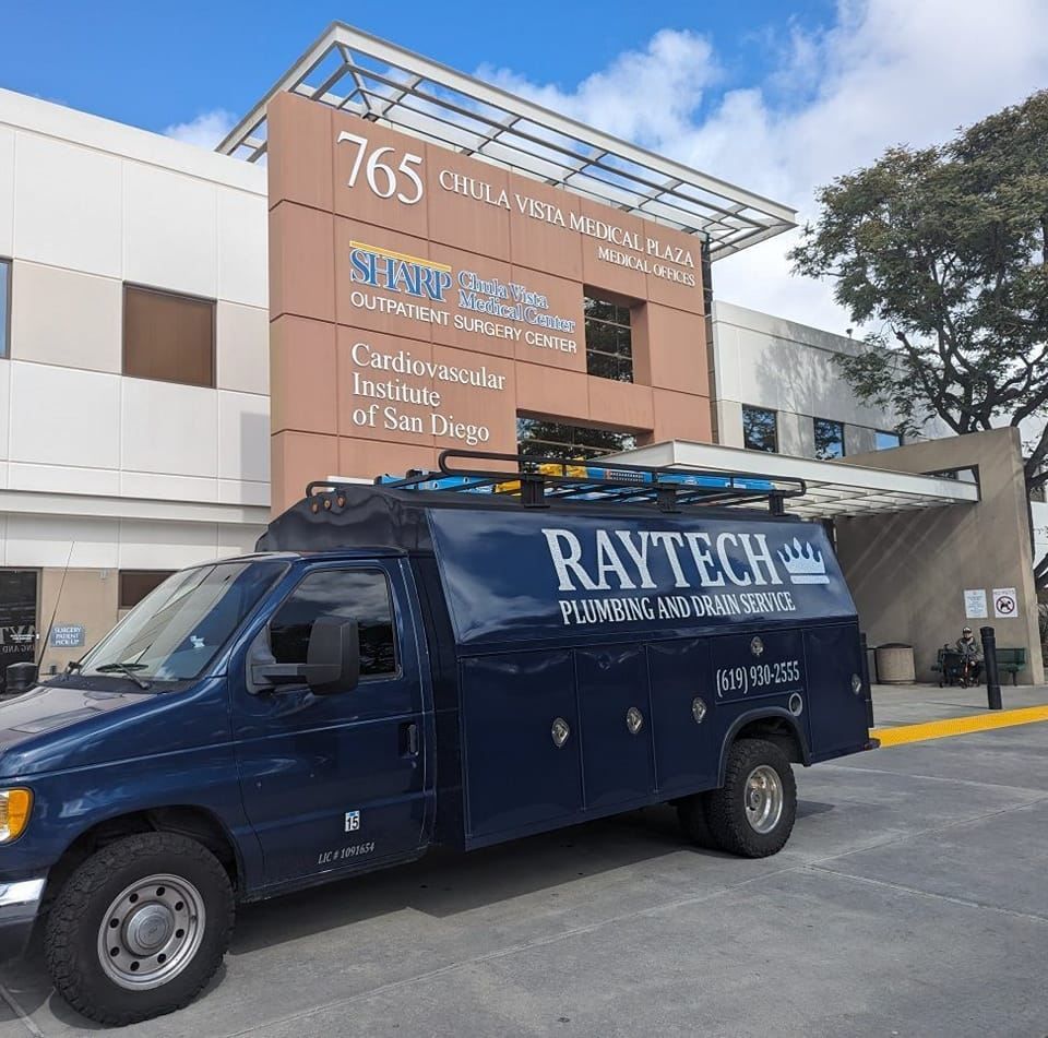 Blue Raytech truck parked in front of Scripps Memorial Hospital building, 7650 Girard Avenue, in La Jolla, CA.
