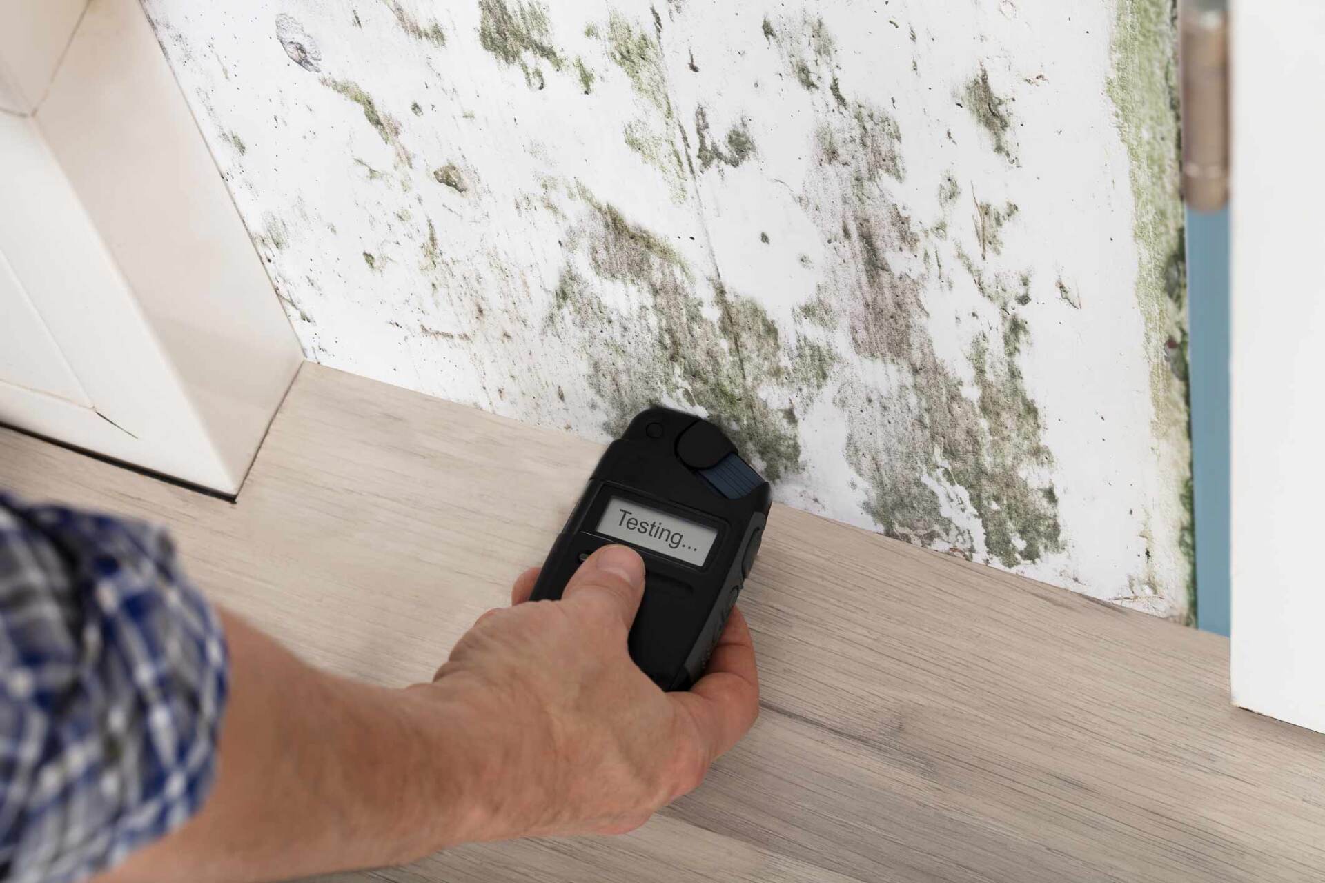 Mold Testing — Bubbled and Smoked Up Ceiling After a Kitchen Fire in Brandon, MS Mold Testing — Man Doing Vacuum on the Floor in Brandon, MS