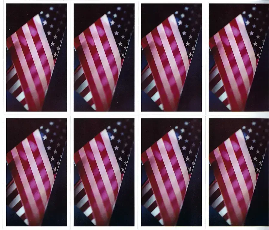 Prayer Cards-- Eight angled American flags on a black background.