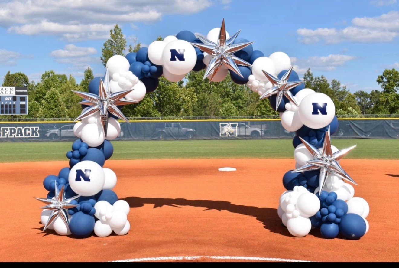 Blue and white balloon arch with