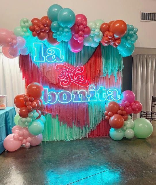 Balloon arch with neon sign