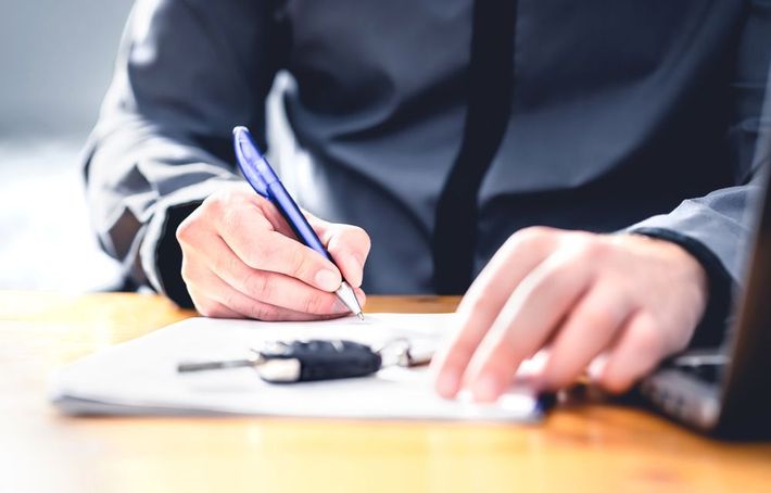 Signing Papers — Puyallup, WA — McCallum License Agency Signing Papers — Puyallup, WA — McCallum License Agency