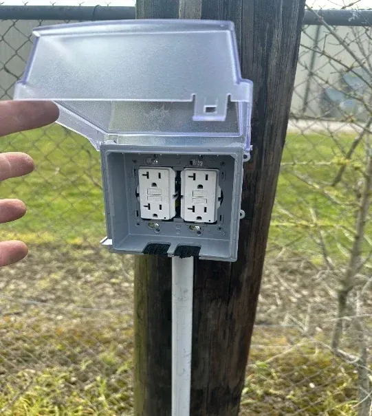 Weather-protected electrical outlet at Wildman Warehouse