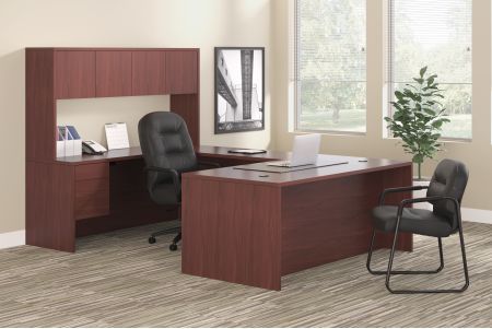Dark wood office furniture set with desk, overhead storage, and chairs.
