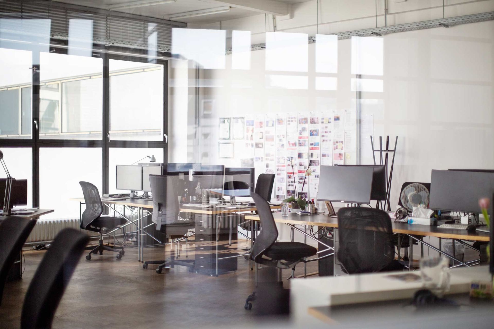 Interior of open office with desk and chairs
