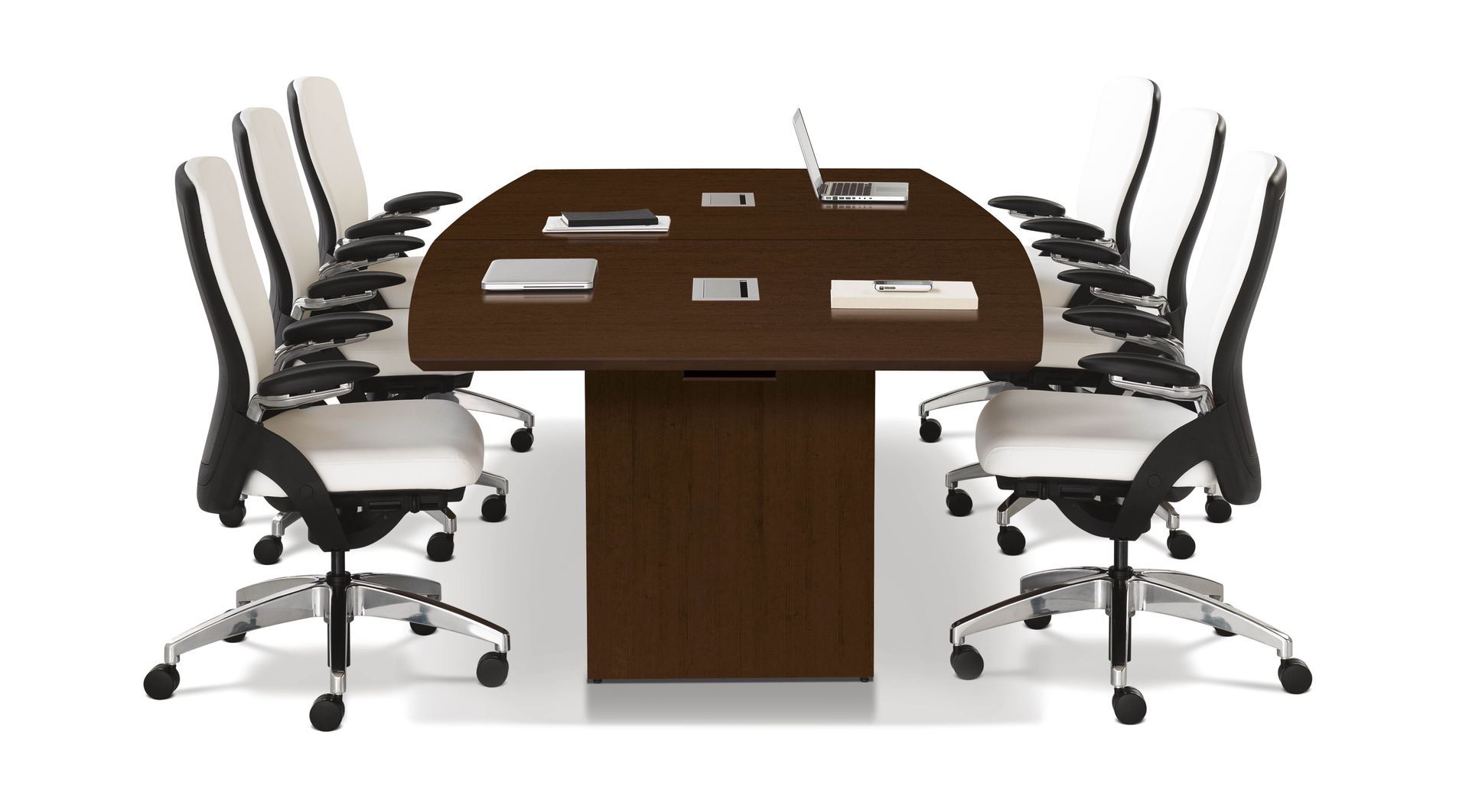 Conference table with several white and black chairs, dark brown wood finish.