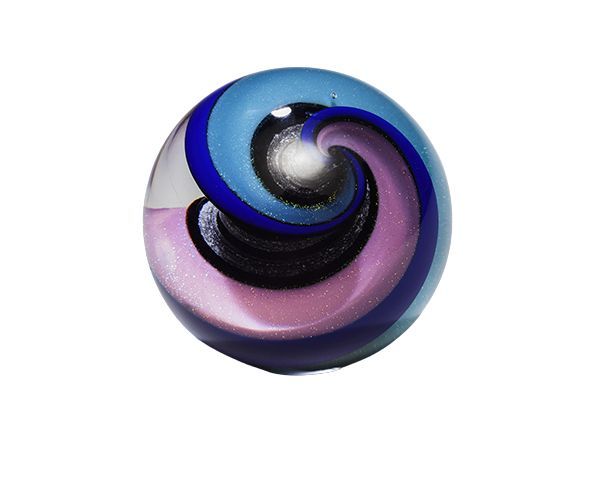 A blue, purple, and pink swirled glass marble on a white background