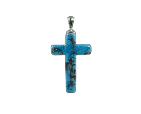 Blue cross pendant with black marbling and a silver bail on a white background