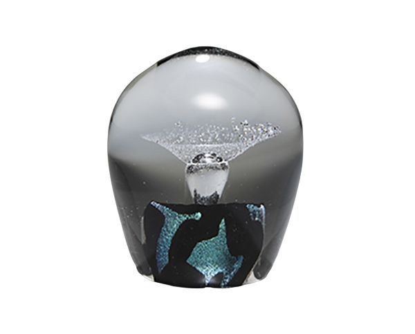 Clear glass paperweight with a dark base and blue-black interior swirl, featuring a small waterfall-like center.