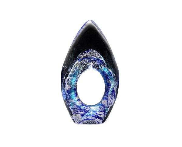 Abstract blue glass art sculpture with a central oval opening and dark pointed top