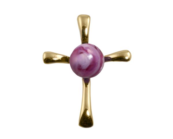 Gold cross pendant with a purple center stone