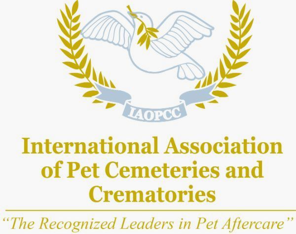 Logo for the International Association of Pet Cemeteries and Crematories with eagle, laurels, and gold text