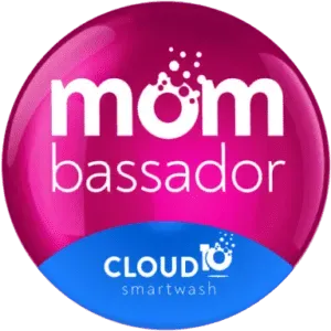 Pink circular “mom bassador” logo with blue “Cloud 10 smartwash” banner