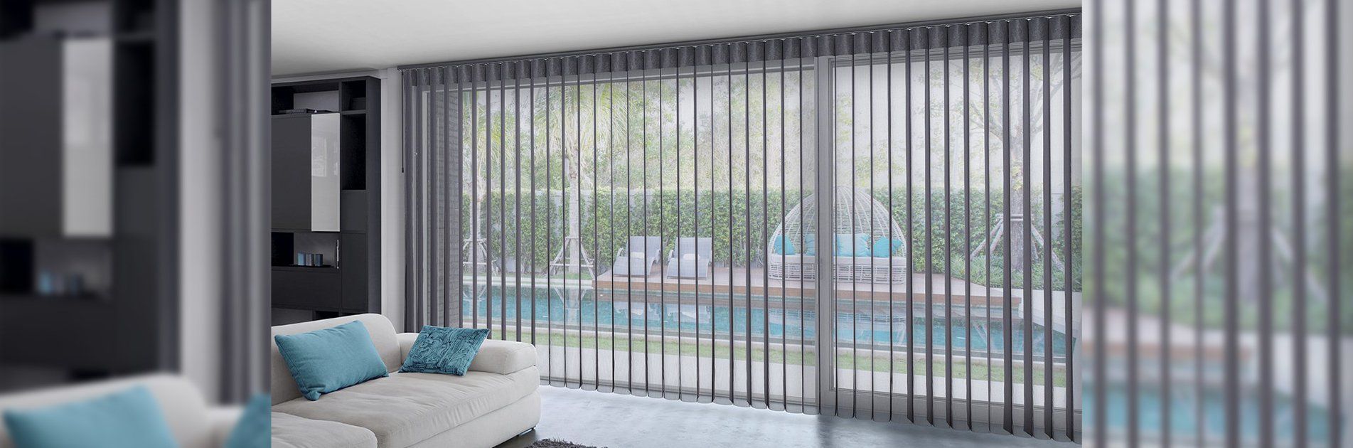 Living Room With Sheer Vertical Blinds Overlooking a Pool and Foliage — Red Door Decor In Dubbo, NSW