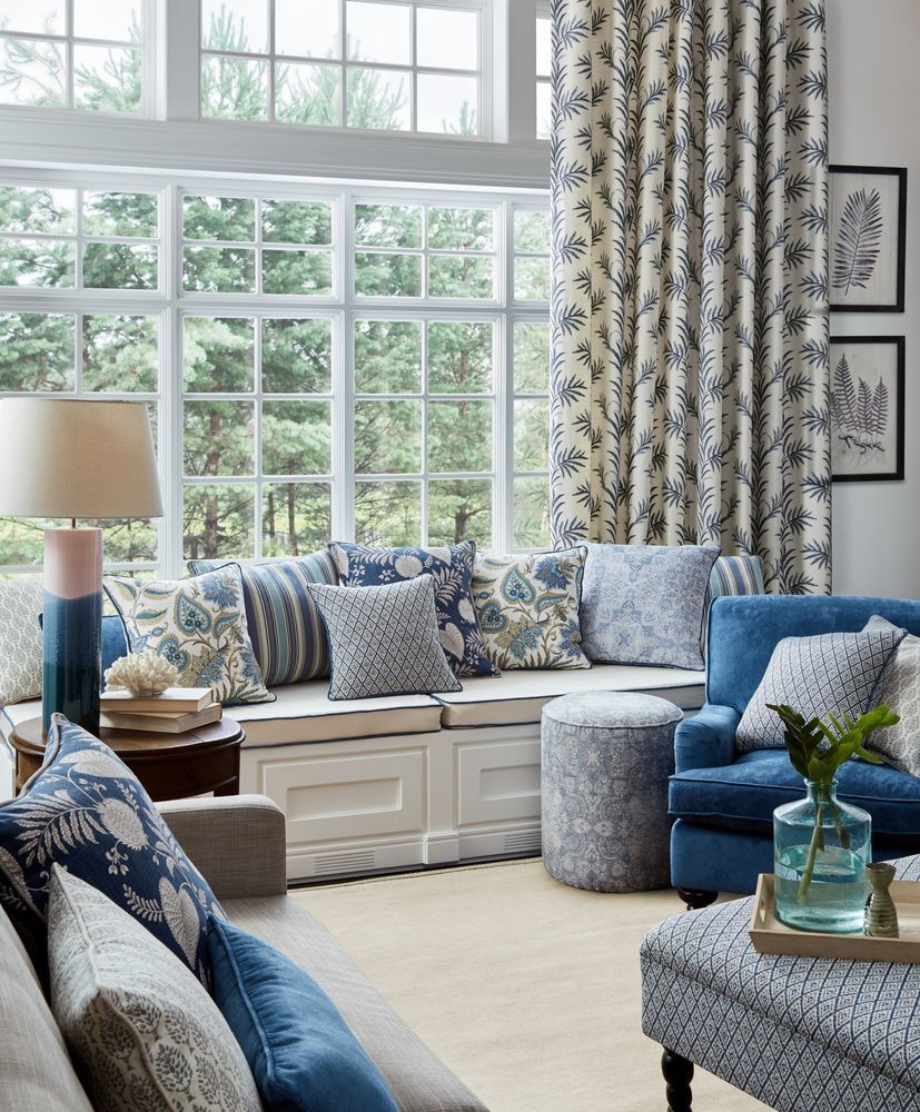 Living Room With A Built-in Window Seat And Patterned Curtains — Red Door Decor In Dubbo, NSW