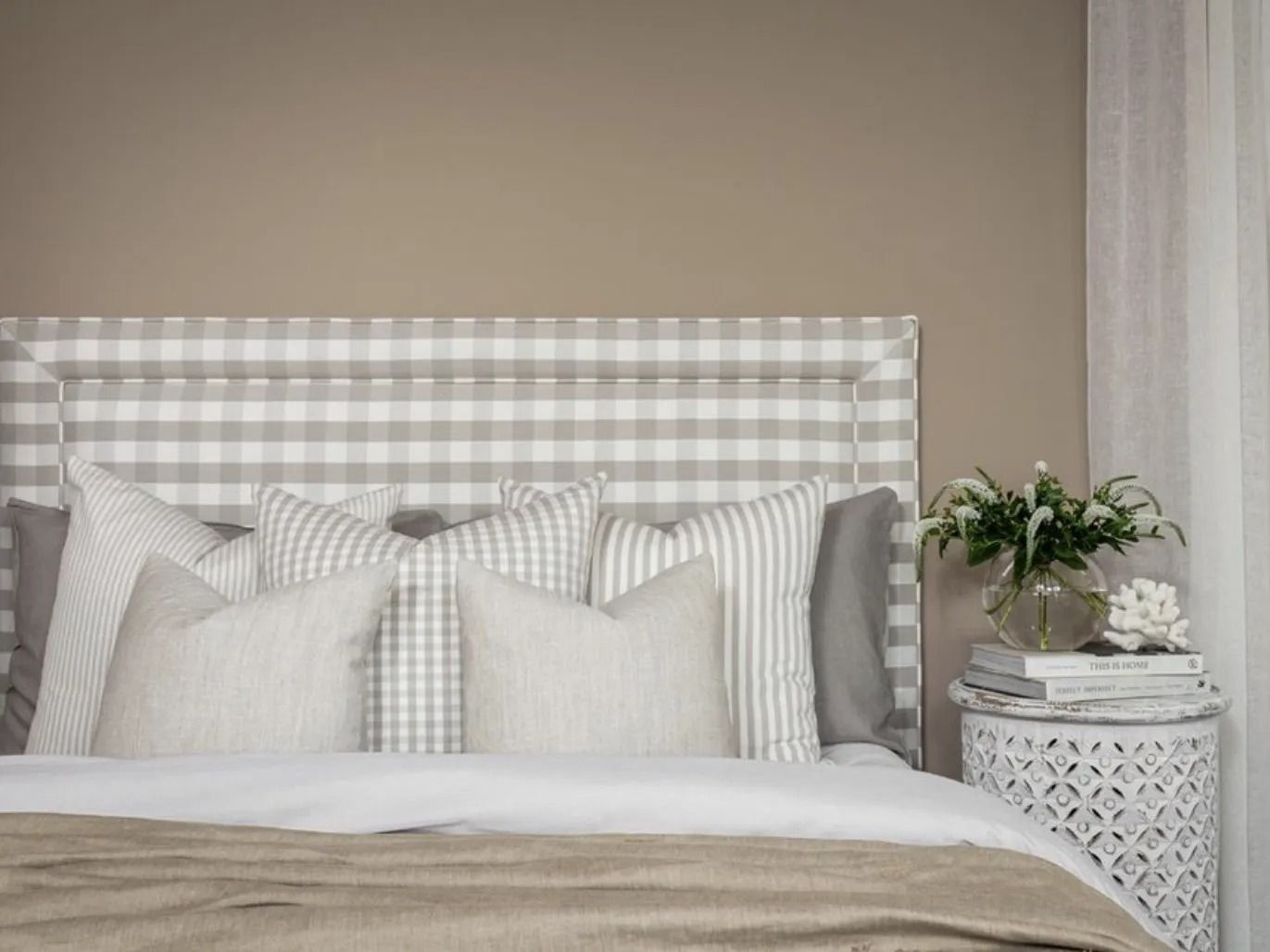 Bedroom With Checkered Headboard, Layered Pillows — Red Door Decor In Dubbo, NSW