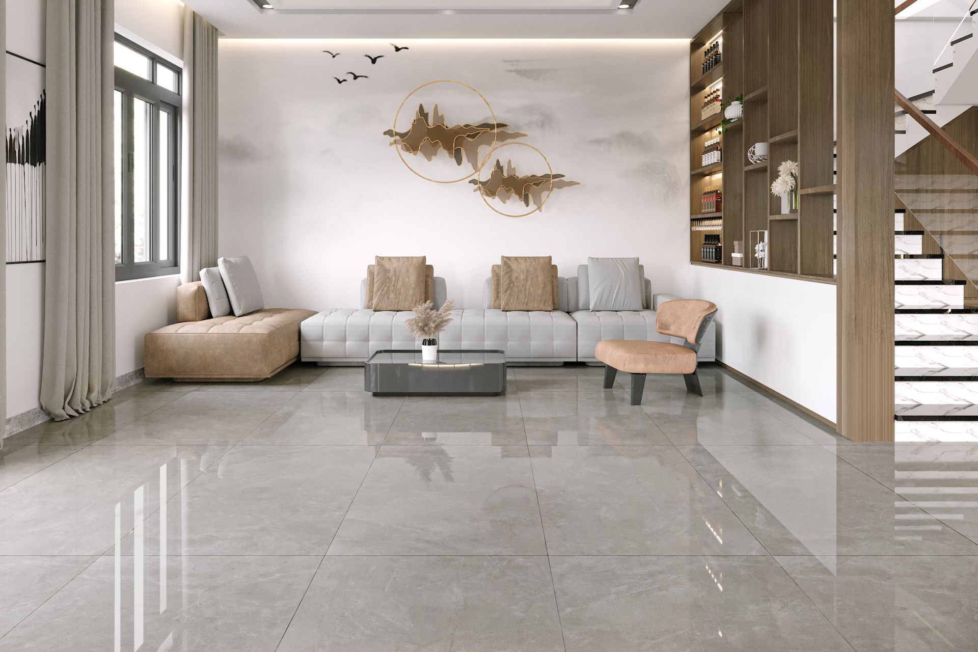 Elegant living room with white walls, gray marble flooring, plants, and a coffee table